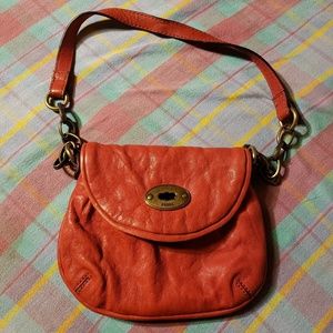 Red Fossil genuine leather purse.